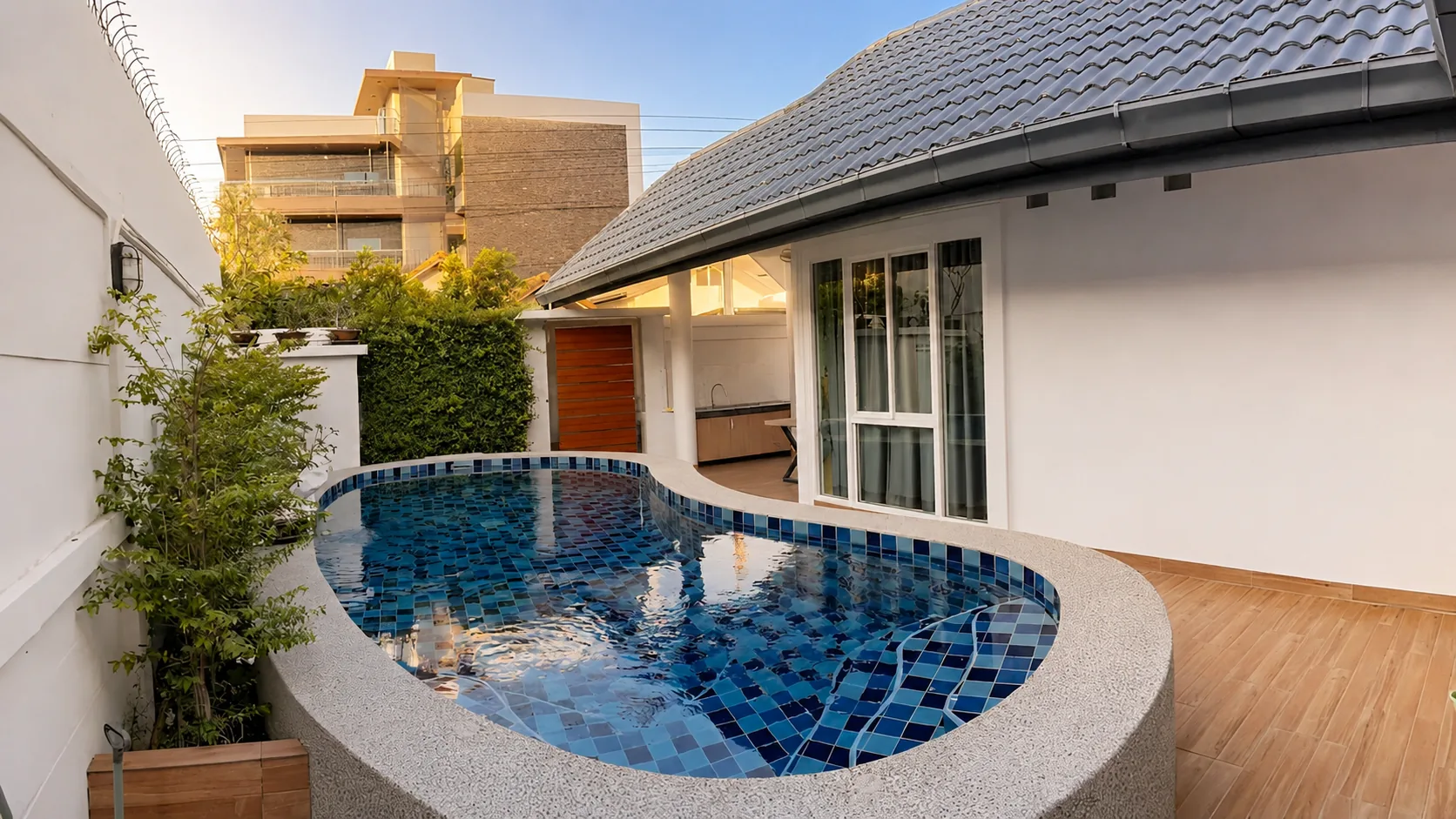 Pool and villa exterior in daylight at After Party Villas, Suksabai Villa, South Pattaya
