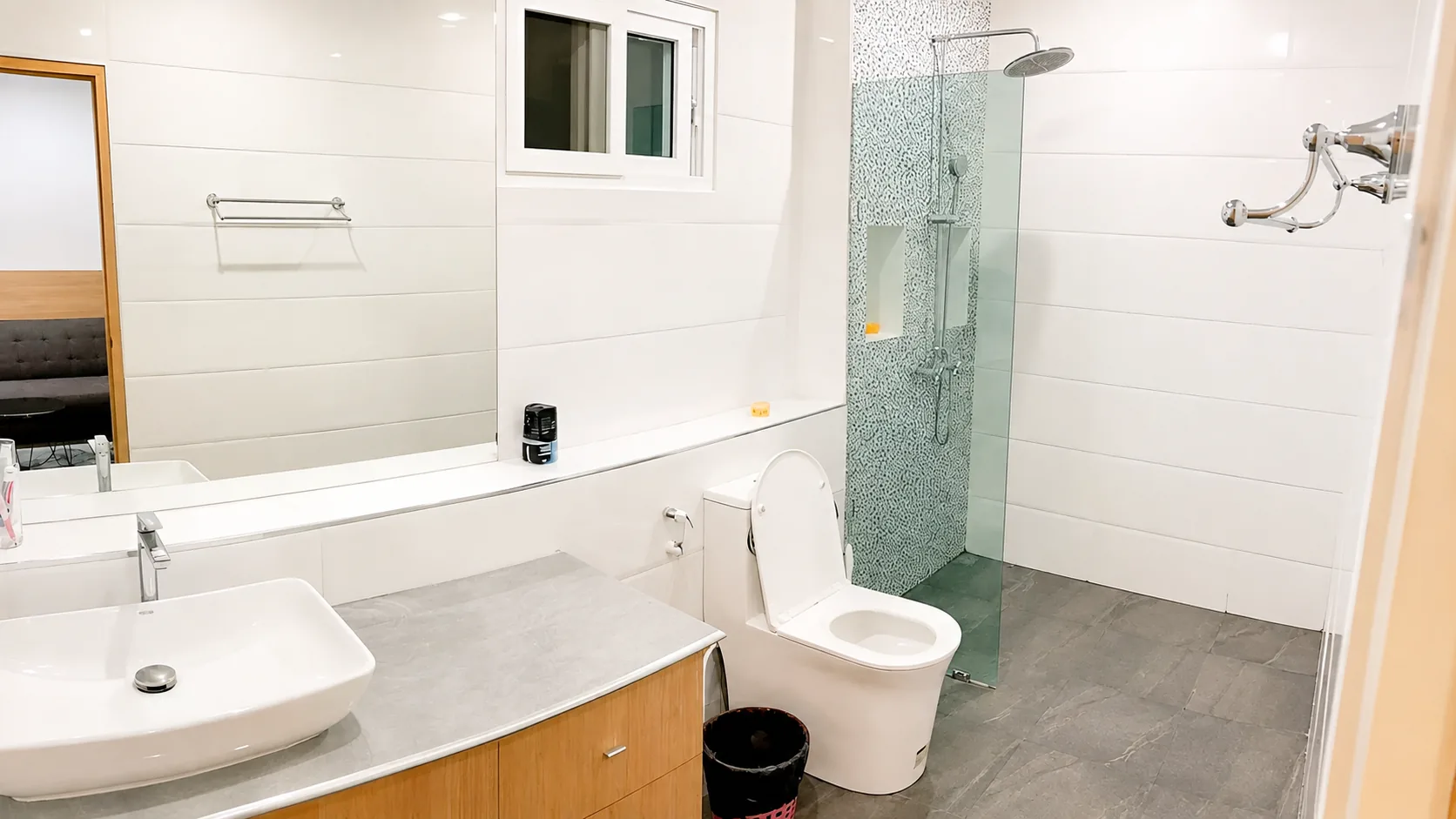 Bathroom with shower and vanity at After Party Villas, Suksabai Villa, South Pattaya